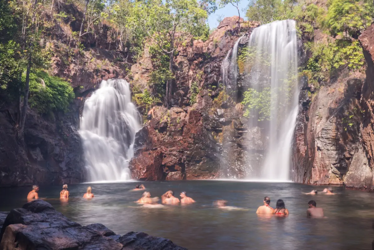 Dundee Adventure Travel | Darwin People swim in a natural waterfall in Outback Australia
