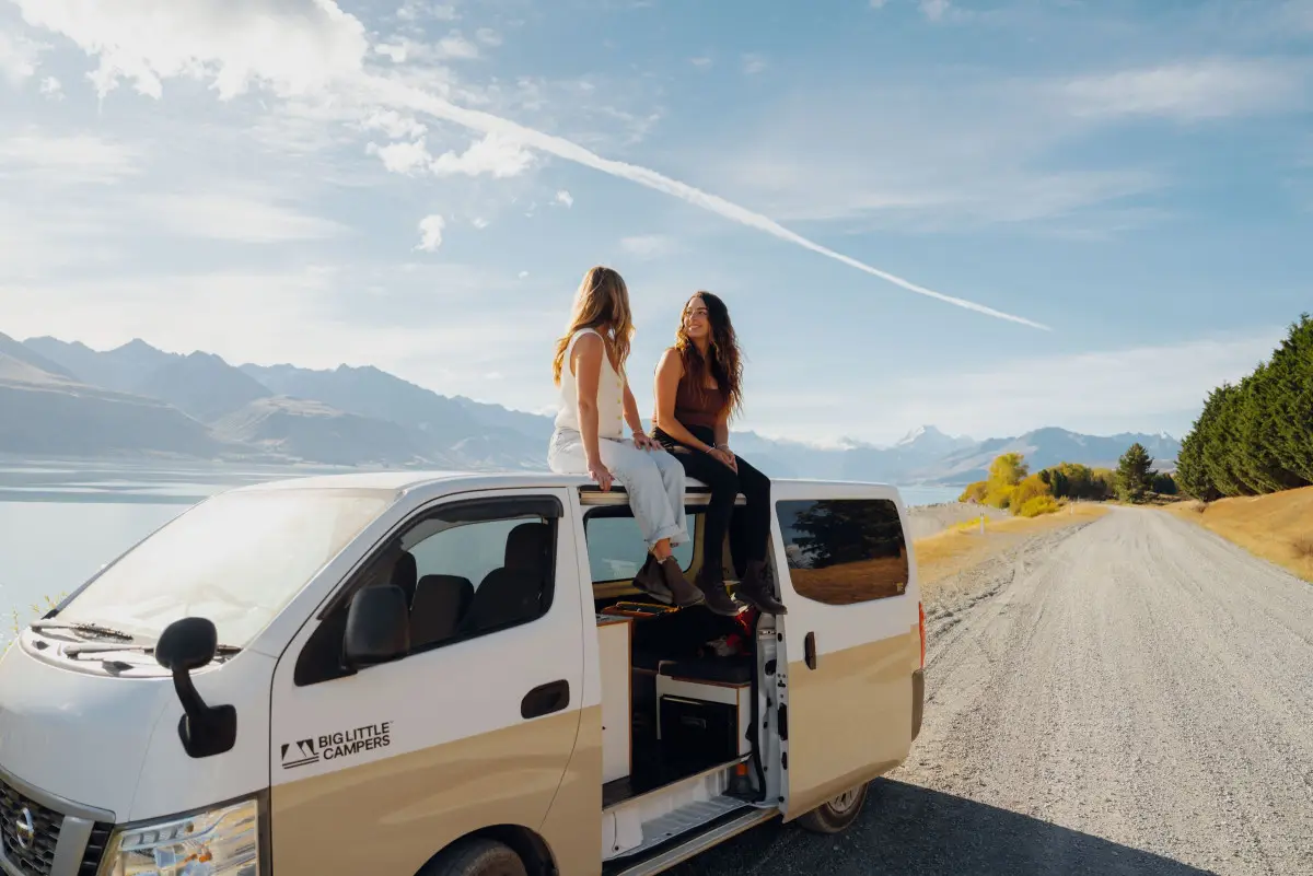 Dundee Adventure Travel | Campervan Hire Couple road tripping with campervan hire Australia