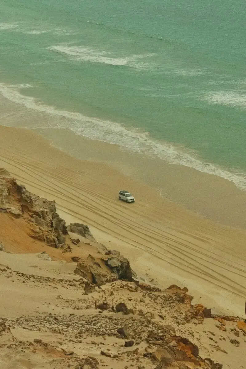 Dundee Adventure Travel | Where To Park In Rainbow Beach Before Your K’gari (Fraser Island) Tour Aerial photo of Rainbow Beach near Inskip Point, Queensland – main departure location for K’gari (Fraser Island) tours.
