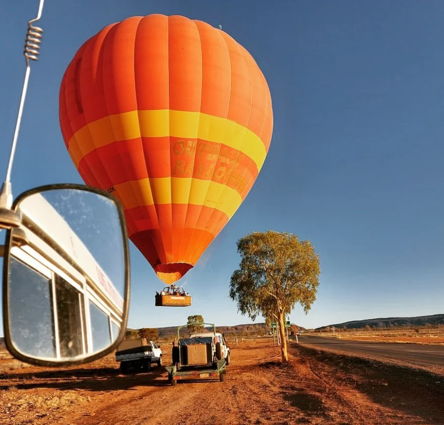 Hot air balloon landing in the desert