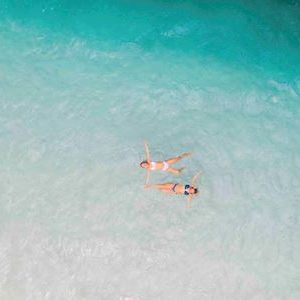 Lake McKenzie is a freshwater lake located on Fraser Island, Australia. The white silica sand and pure waters are some of the biggest attractions in Australia.