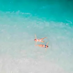 Lake McKenzie is a freshwater lake located on Fraser Island, Australia. The white silica sand and pure waters are some of the biggest attractions in Australia.