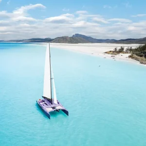 Camira sailing past Hamilton Island and Daydream Island