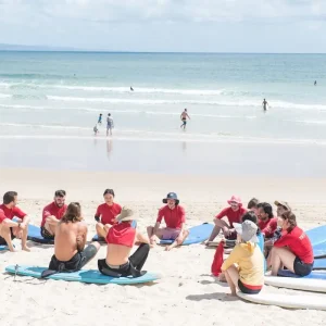 Dundee Adventure Travel | Noosa Learn to Surf – Group & Multi-Day Lessons Learn to Surf at Noosa Main Beach with Merrick’s Noosa Learn to Surf