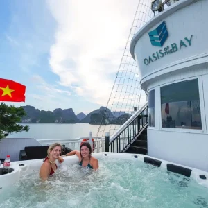 Vietnam Intro 12 days tour boat cruising through Ha Long Bay