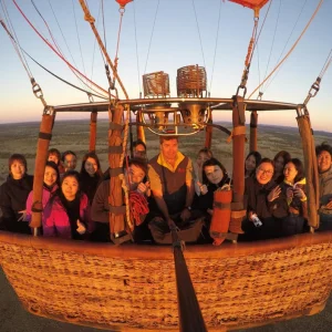 hot air balloon floating over Australian Outback