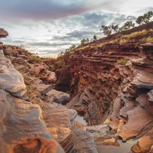 Visit Karijini’s stunning red rock gorges during the broome to perth adventure tour
