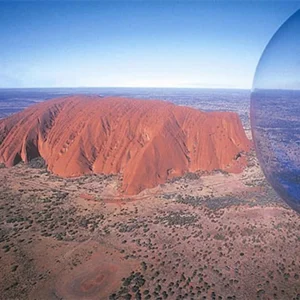 helicopter flying over Kings Canyon Red Centre