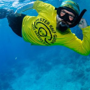 Russell-Hosp-Master-Reef-Guide-being-silly-while-on-great-barrier-reef-cairns-for-Coral-Nuture-Program