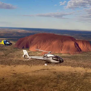 helicopter flight red centre australia sunset