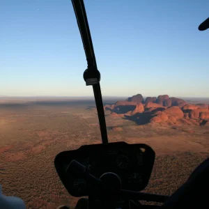 helicopter flying over uluru australia