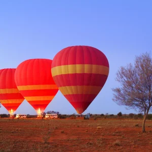 Hot air balloon drifting across Australian Outback