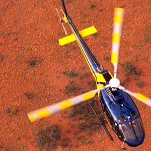 helicopter flight red centre australia sunset