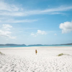 Relaxing on Whitehaven Beach during Hammer Whitsundays maxi sailing tour